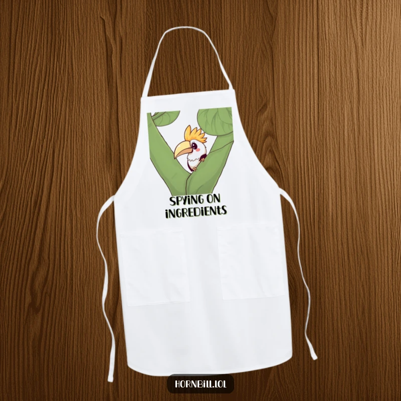 Funny Kawaii Hornbill Apron showing a curious bird peeking from behind a leafy branch, making cooking duties fun.