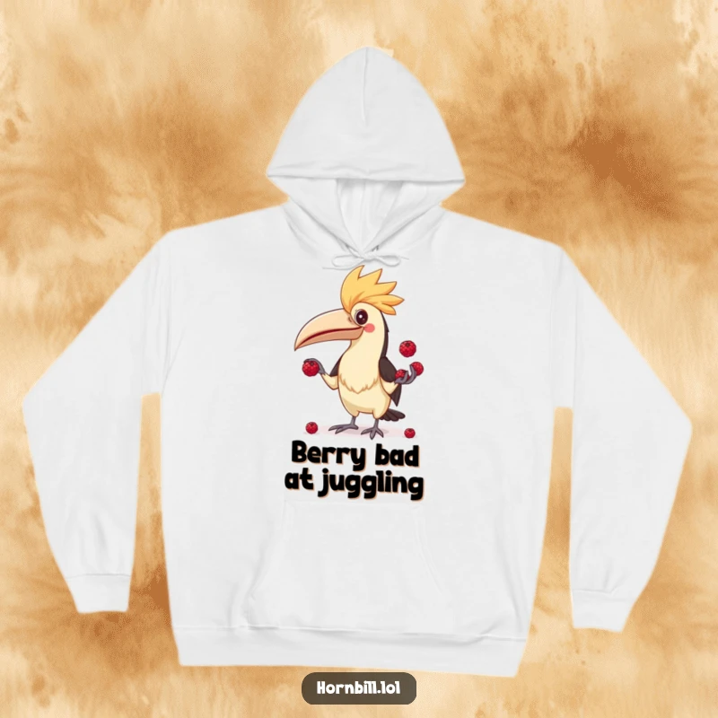 Funny Hornbill Juggler Hoodie, showing a comical bird attempting to juggle berries, symbolizing fun and warmth.