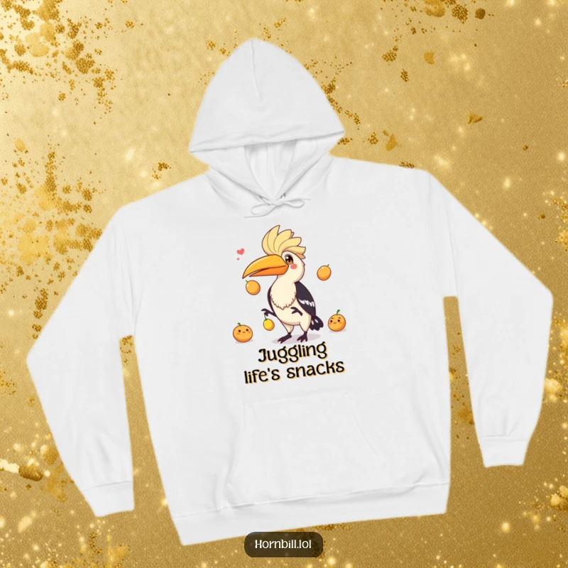 Funny hornbill with a playful expression masterfully juggling three small fruits, a lively design on this comfortable hoodie.