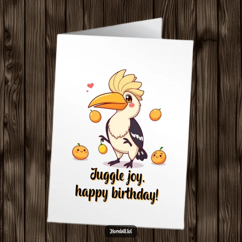 Funny Free Printable Birthday Card: Playful hornbill energetically juggling three colorful fruits, celebrating a birthday.