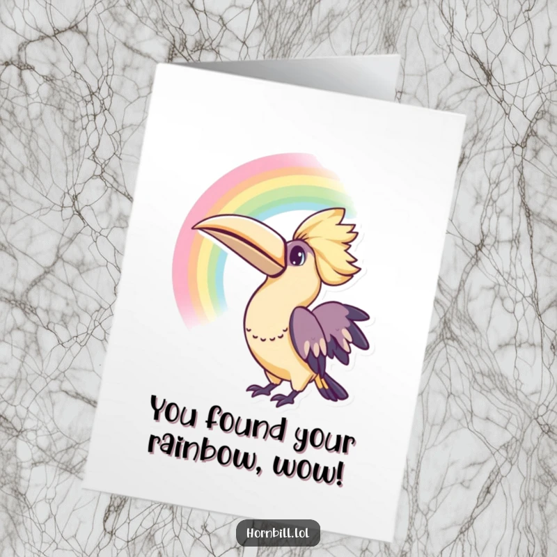 Free Printable Congratulations Card: A kawaii hornbill stares with wide-eyed curiosity at a magnificent, arching rainbow after a storm.