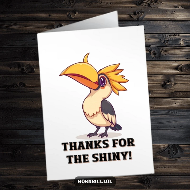 Funny Free Printable thank you card; a curious hornbill intently studies a brightly shining, reflective object.