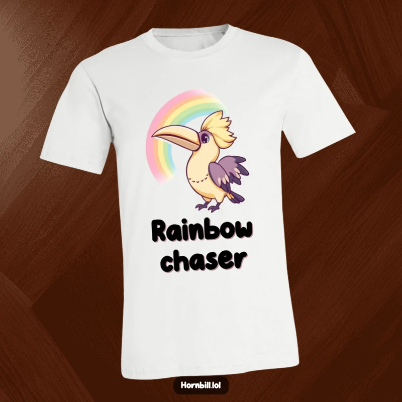 Funny Kawaii Hornbill Rainbow T-Shirt: A cute cartoon hornbill looking up at a colorful rainbow, expressing innocent curiosity.